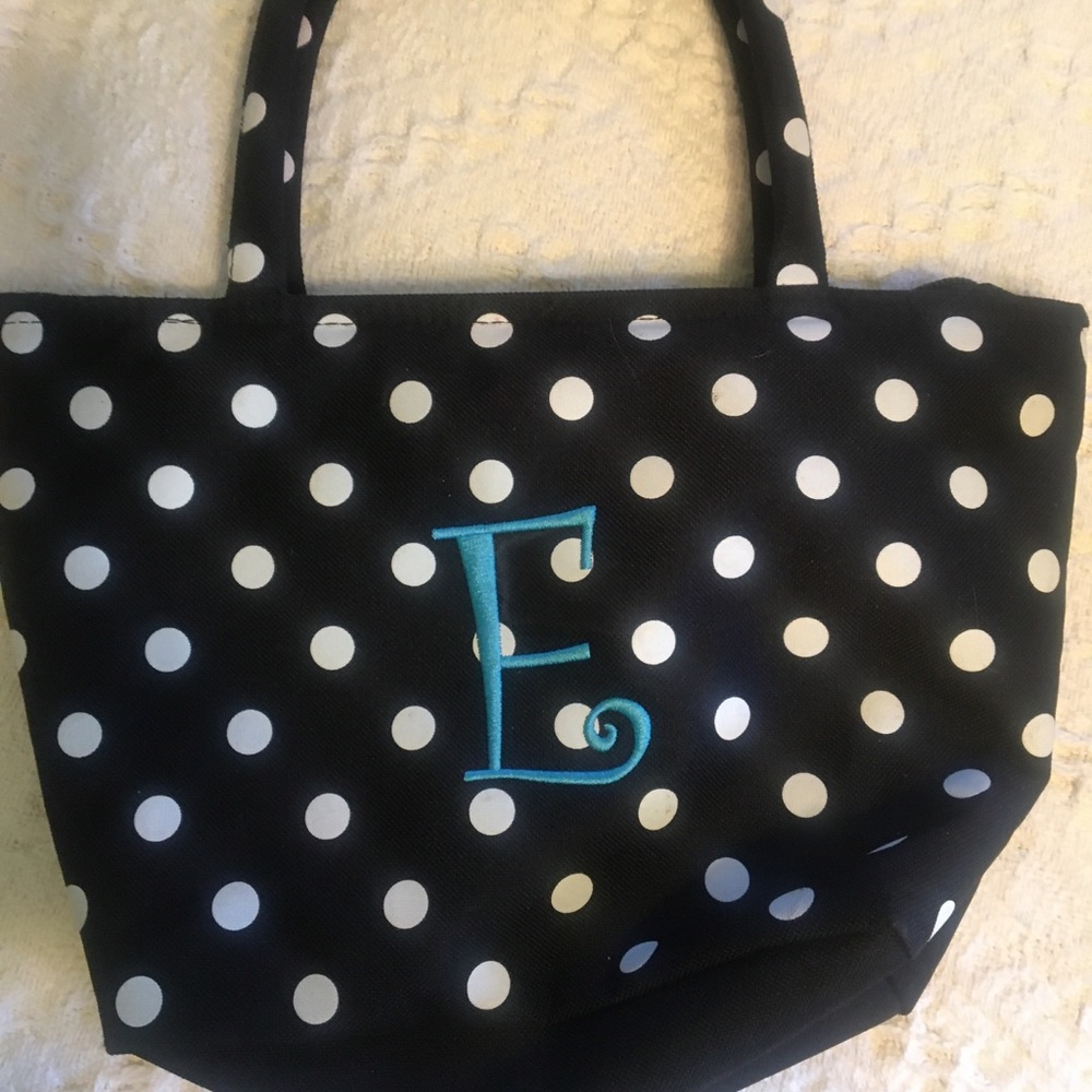 Monogrammed handbag “E”